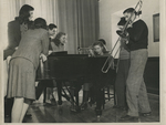 Students gather to enjoy some live music, ca. late 1940s.
