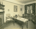 A furnished dorm room on campus, ca. 1928.